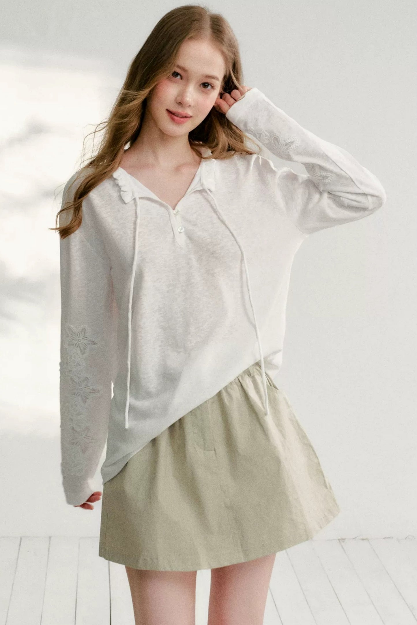 Hollow Floral Tie-Up Blouse