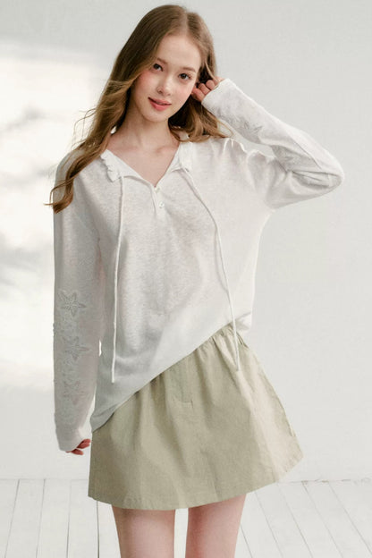 Hollow Floral Tie-Up Blouse