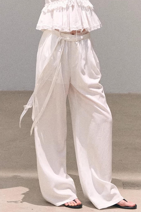Pantalones de lino y lyocell con encaje