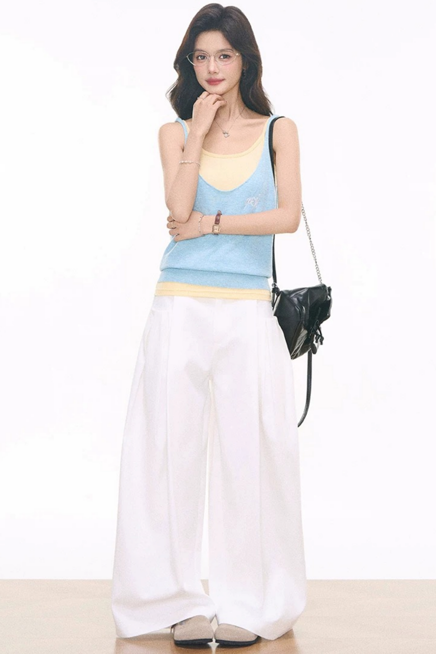 Completo canotta, gilet e pantaloni a maglia