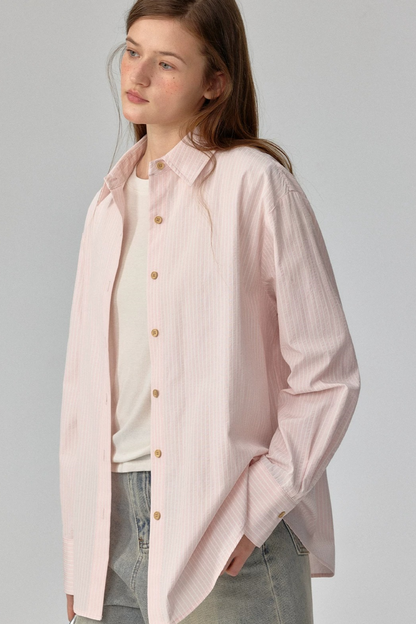 Blusa a rayas con textura y hombros caídos