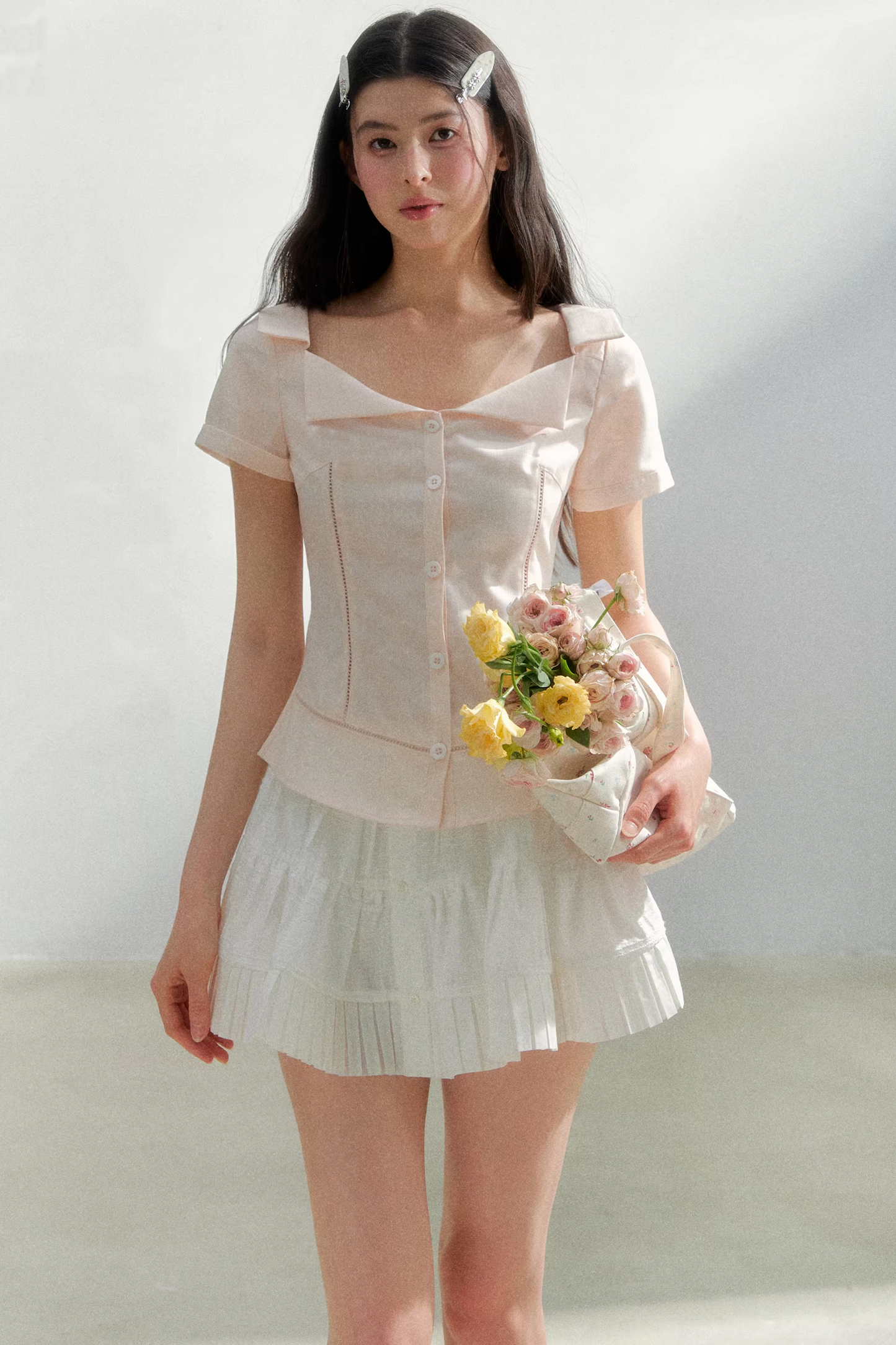 Blusa retrò rosa con risvolto