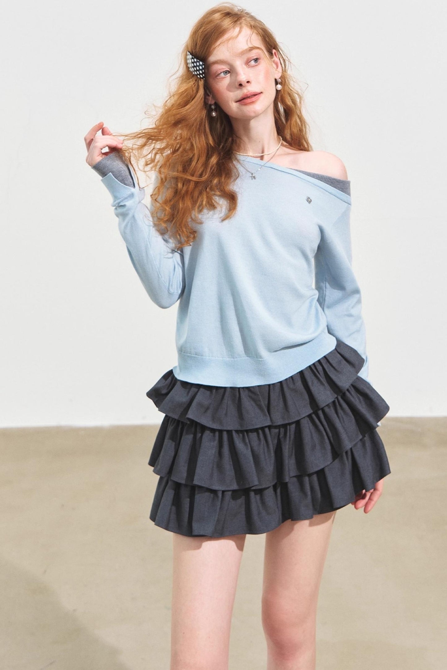 Contrasting Slanted Two Sweaters