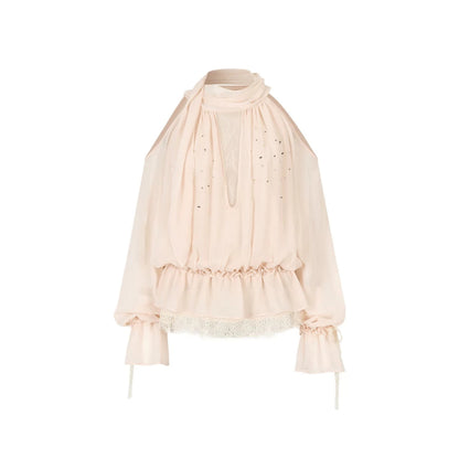 Blusa in tessuto velato e rete con strass