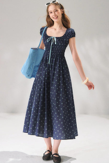 Abito floreale blu navy con lacci