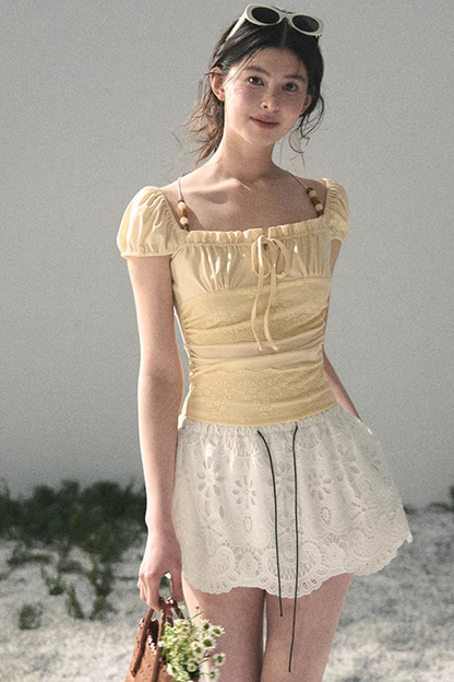 Haut dos nu en dentelle de rêve