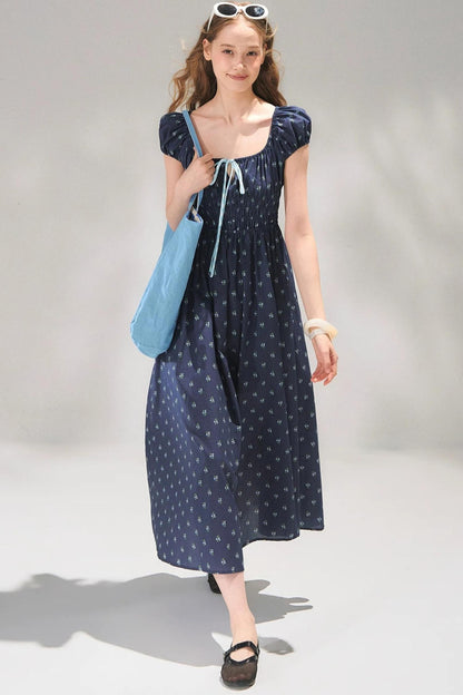 Abito floreale blu navy con lacci