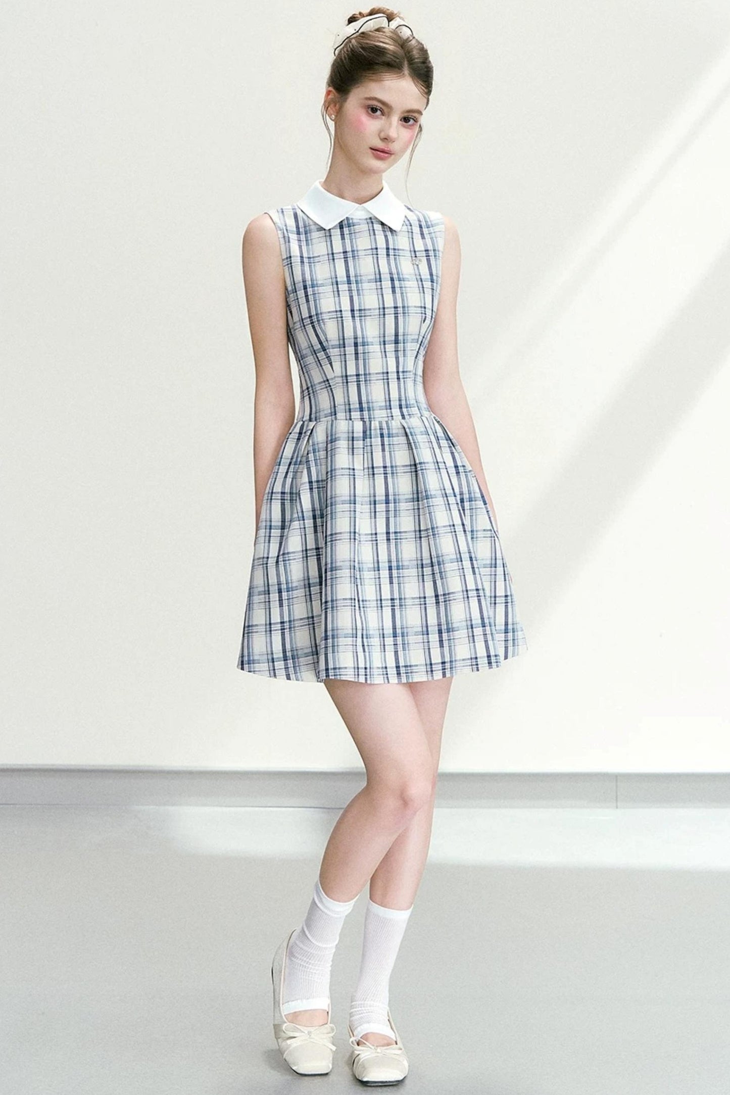 Abito elegante a quadri blu