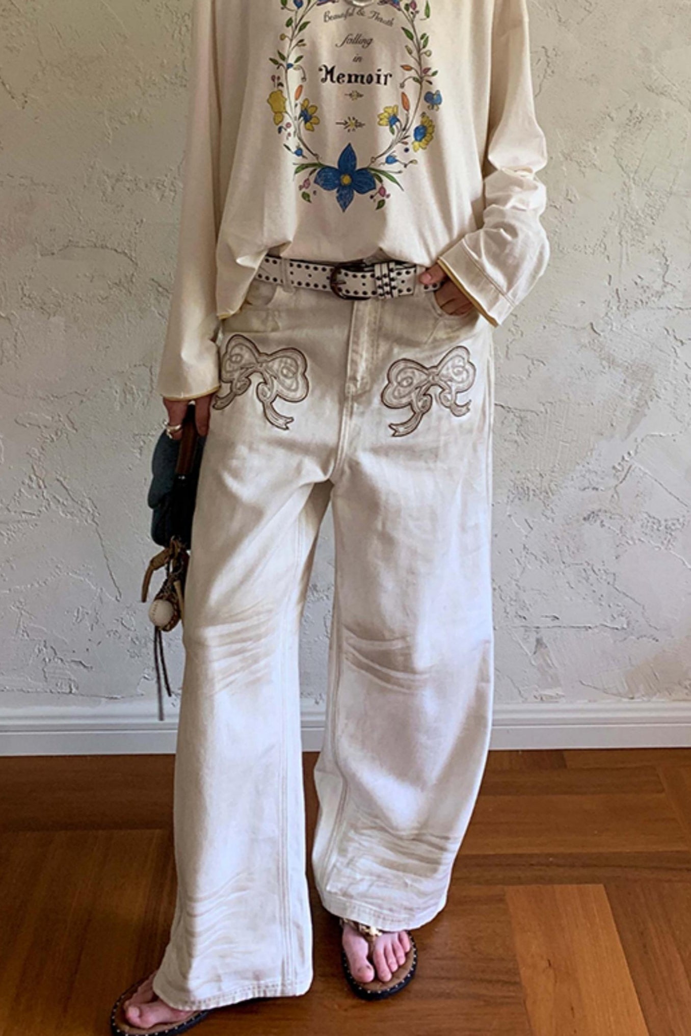 Comfortable Bow Appliqué Distressed Jeans