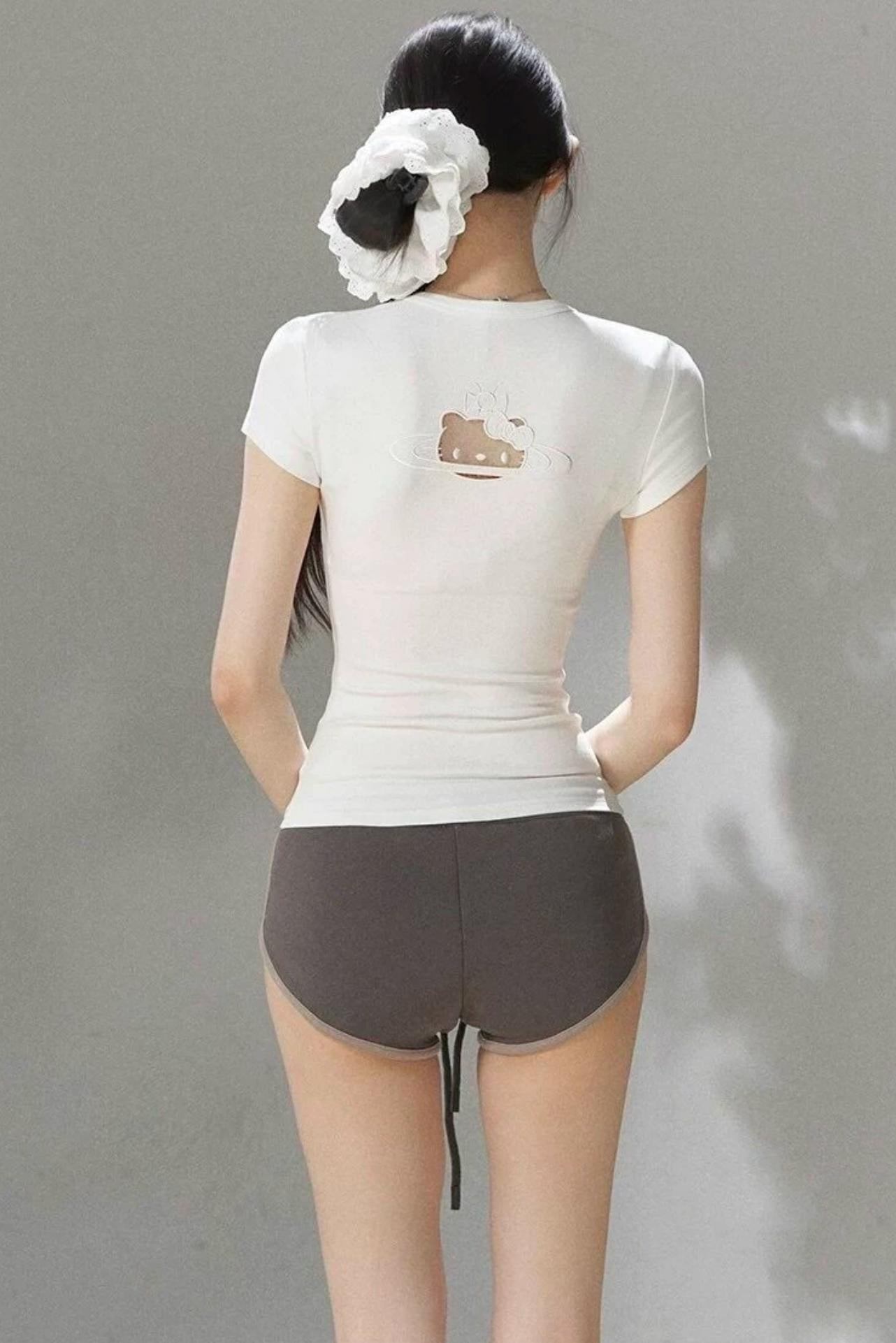 Top in maglia traforata ricamata