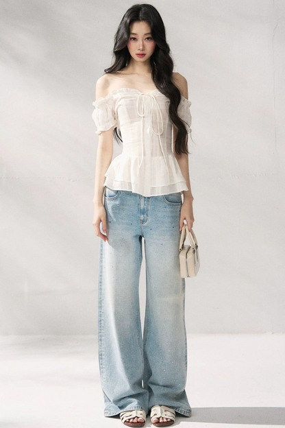 Pantaloni in denim blu a gamba dritta