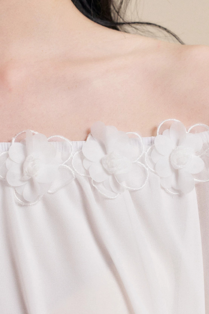 Blusa de gasa con flores tridimensionales