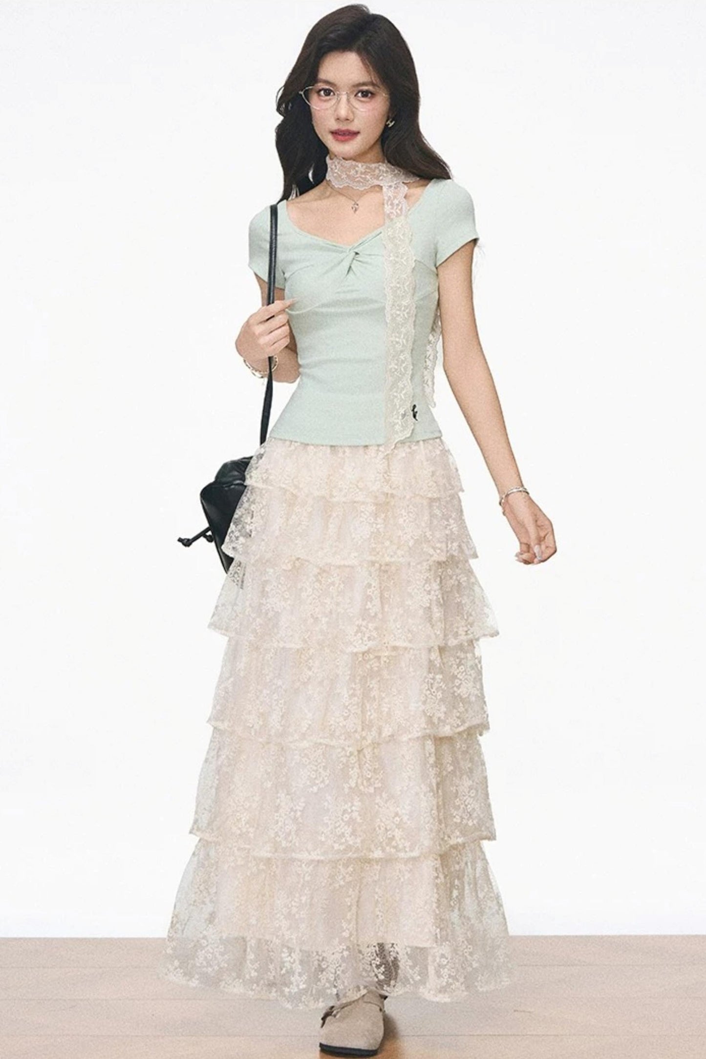 Conjunto coordinado de top y falda de encaje de punto