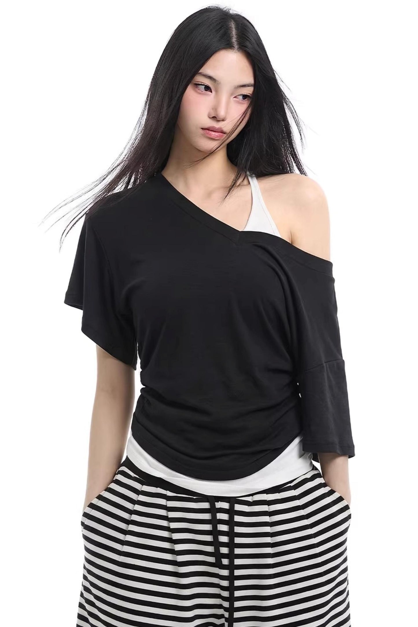 Set top a strati nero con spalle scoperte