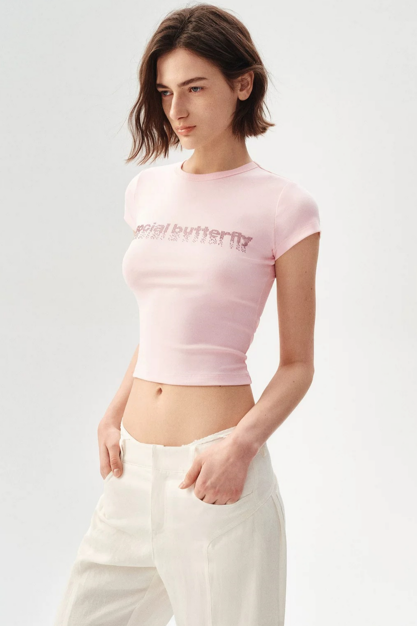 Maglia narrativa rosa con strass