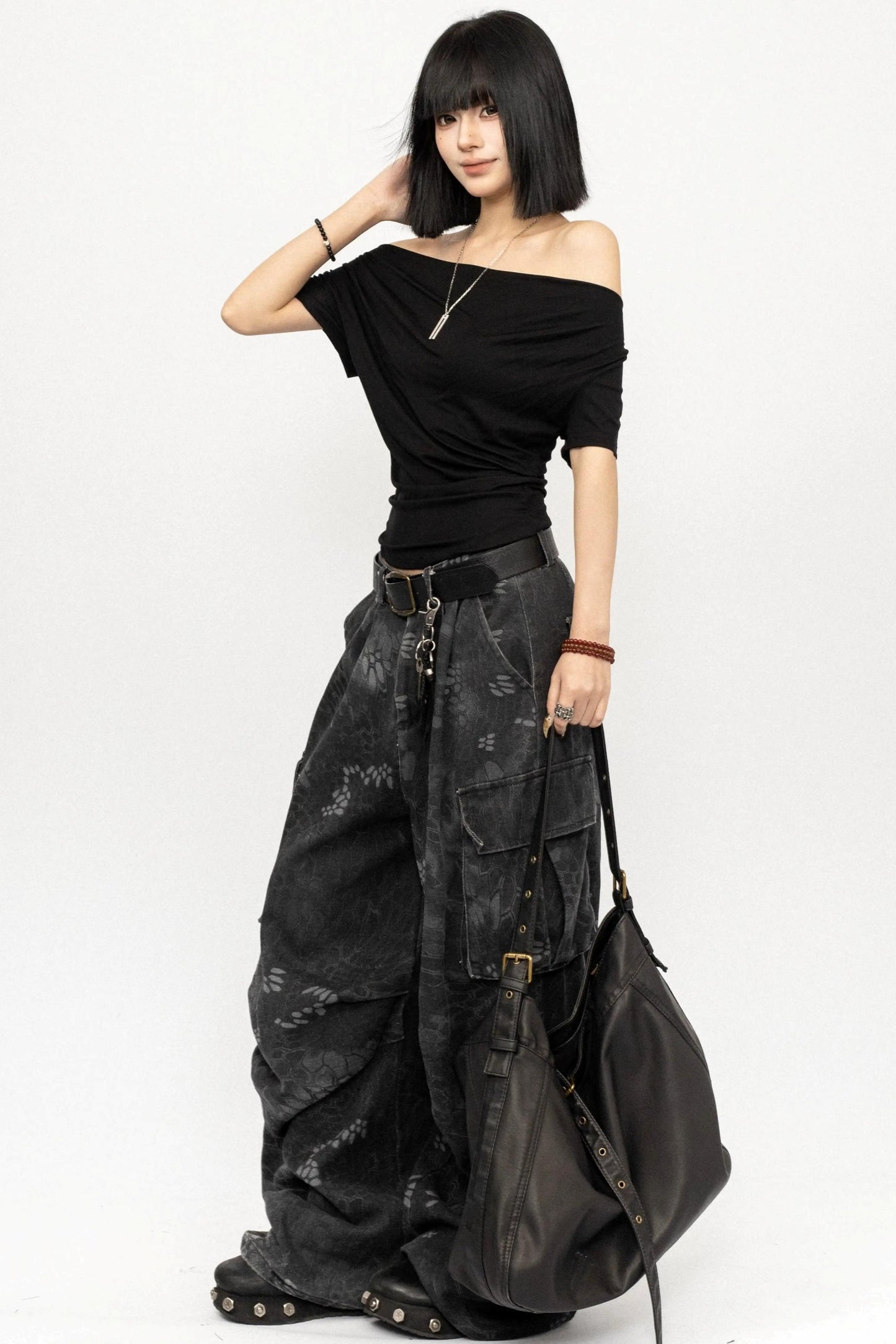 Schwarzes schulterfreies, schlank machendes Oberteil