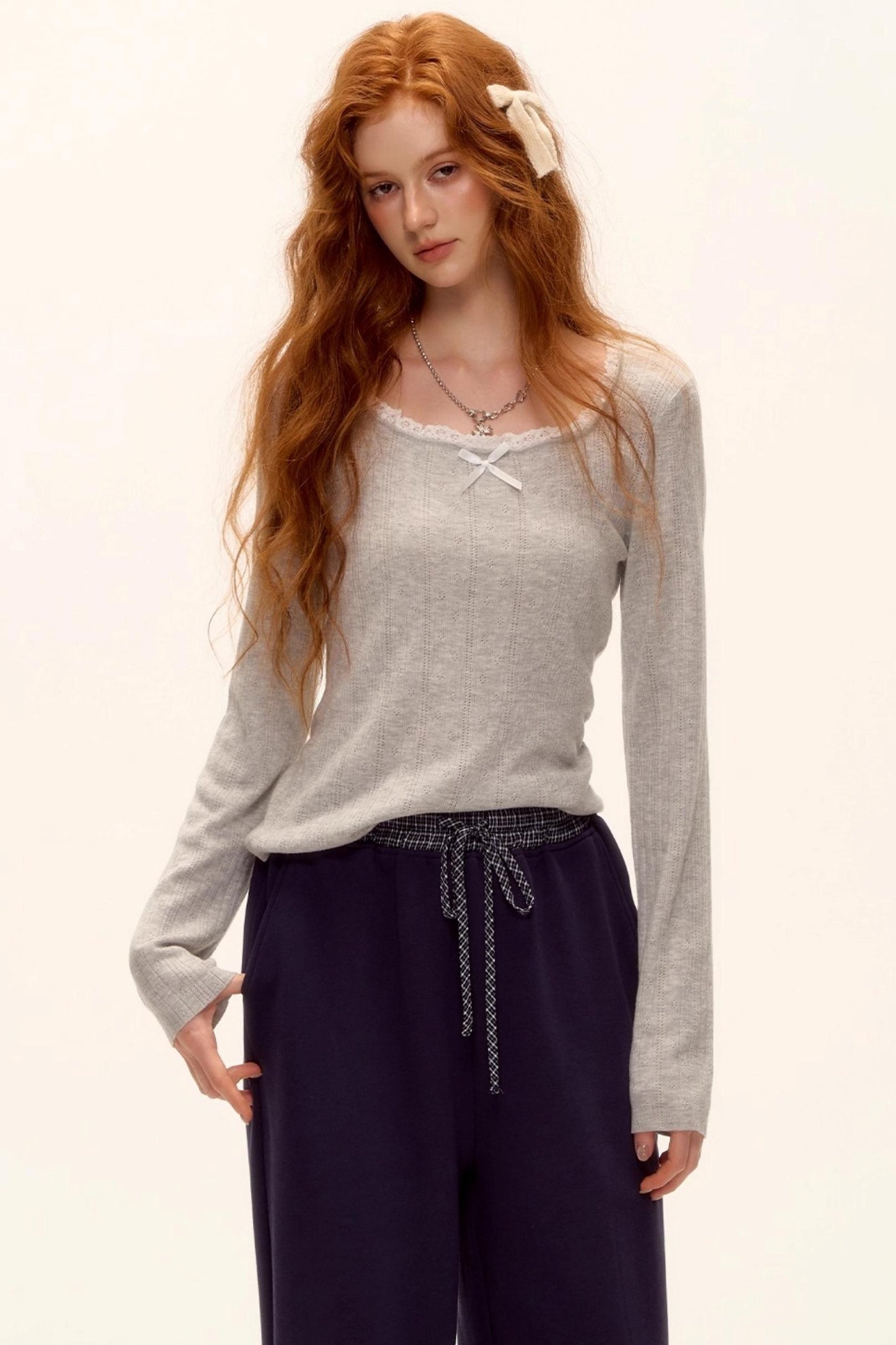 Lace-Trimmed Bow Hollow Knit Top
