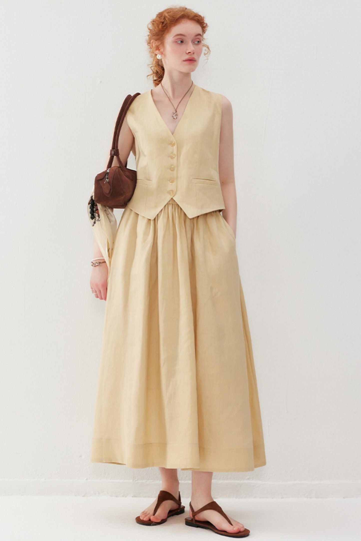 Elegant V-Neck & Pleated Skirt Set