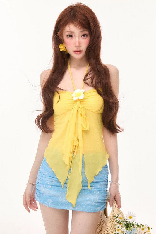 Conjunto llamativo de blusa de cuello halter y falda con flores