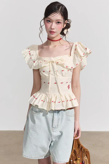 Blusa francese a fiori con volant