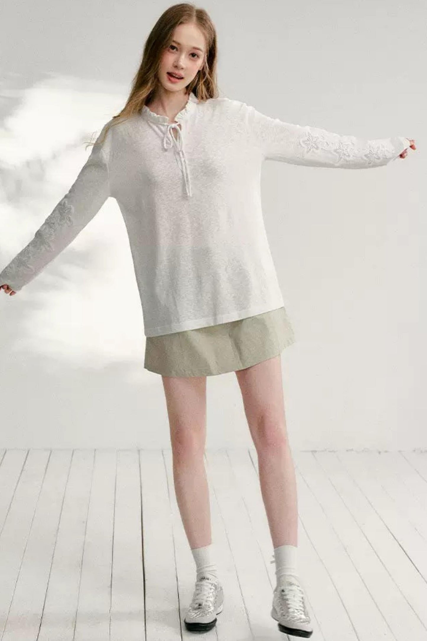 Hollow Floral Tie-Up Blouse