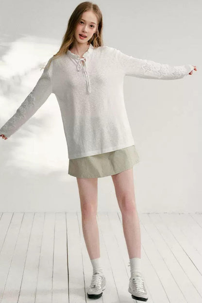 Hollow Floral Tie-Up Blouse
