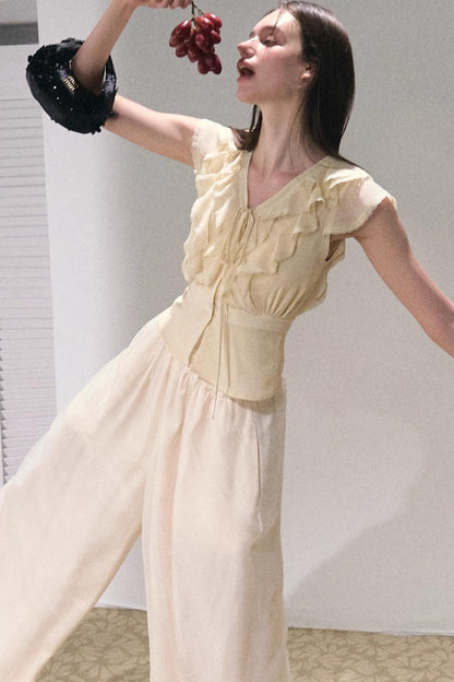 River Ruffle Sleeveless Waist Cinched Top