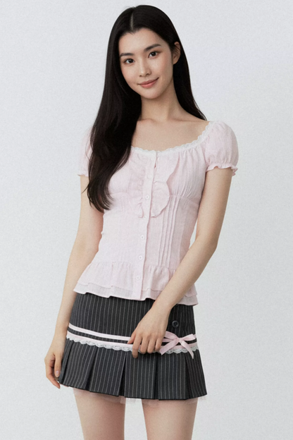 Conjunto de blusa con volantes rosa puro