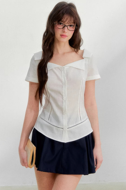 Blusa retrò rosa con risvolto