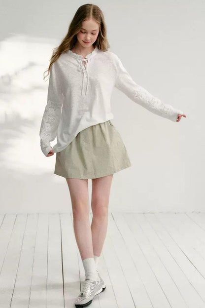 Hollow Floral Tie-Up Blouse