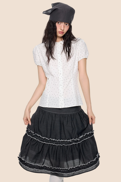 Blusa a pois con maniche a sbuffo