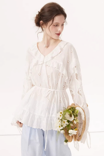 Blusa bordada con mangas farol