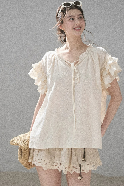 Bestickte V-Ausschnitt-Bluse