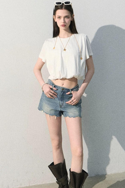 Blusa in lino plissettata a bocciolo