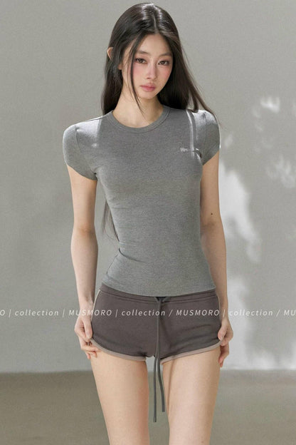 Top in maglia traforata ricamata