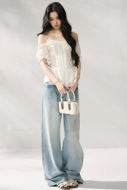 Pantaloni in denim blu a gamba dritta