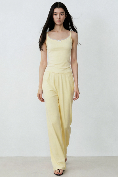 Completo con gilet in pizzo giallo crema