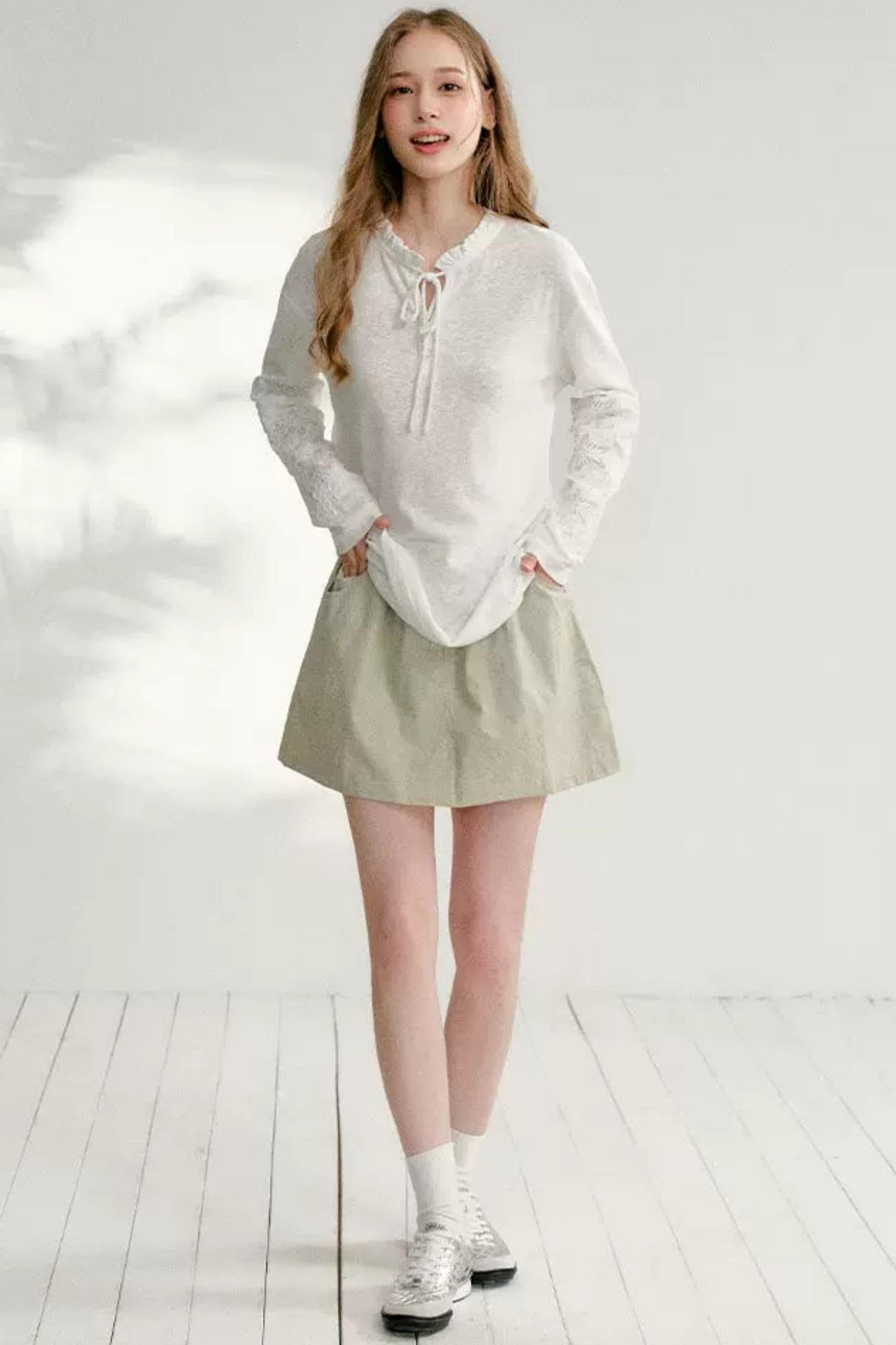 Hollow Floral Tie-Up Blouse