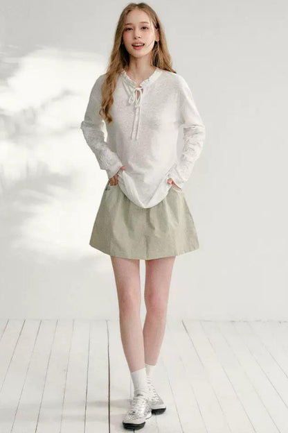 Hollow Floral Tie-Up Blouse