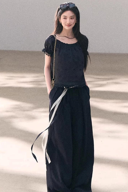 Pantalones de lino y lyocell con encaje