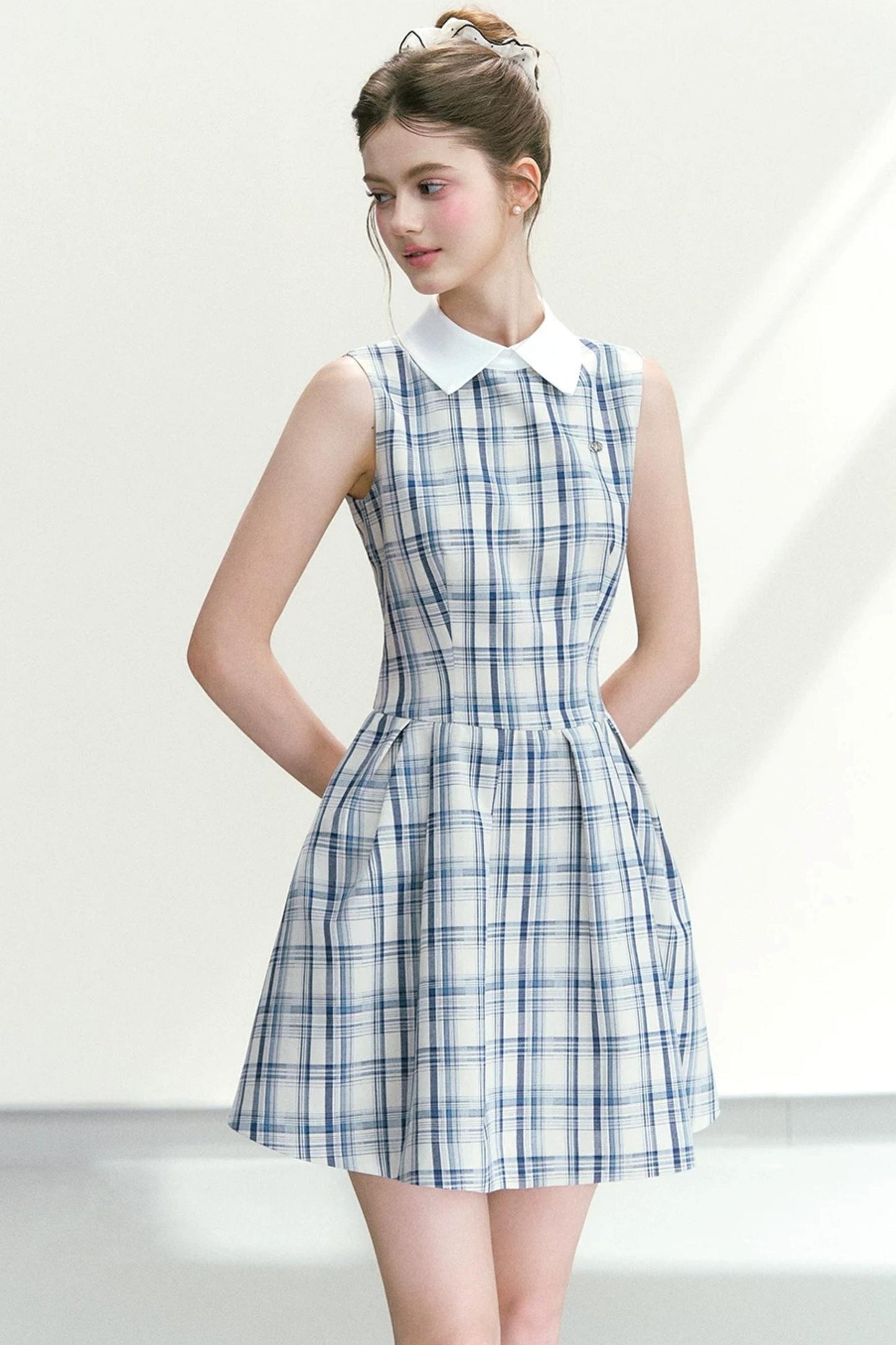 Abito elegante a quadri blu