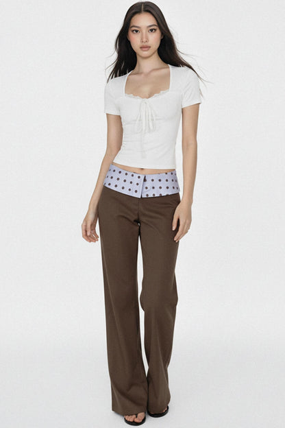 Pantalon plissé à pois