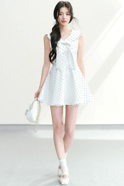 Vestido de lunares con cuello de lazo