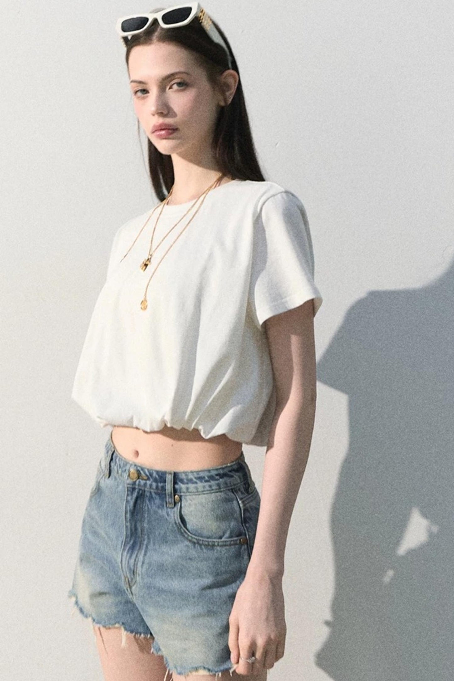 Blusa in lino plissettata a bocciolo