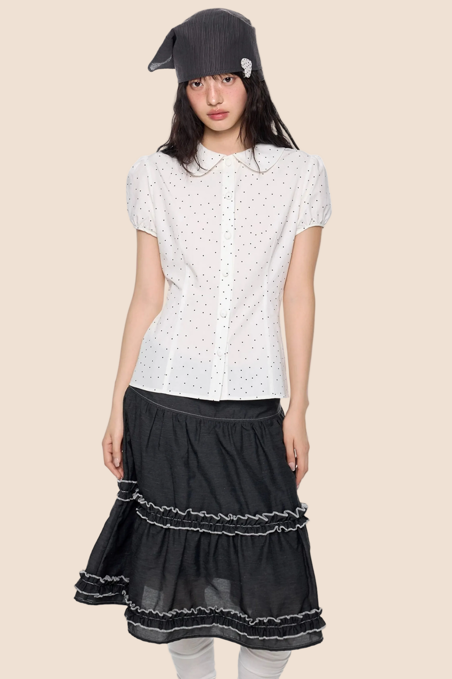 Blusa a pois con maniche a sbuffo