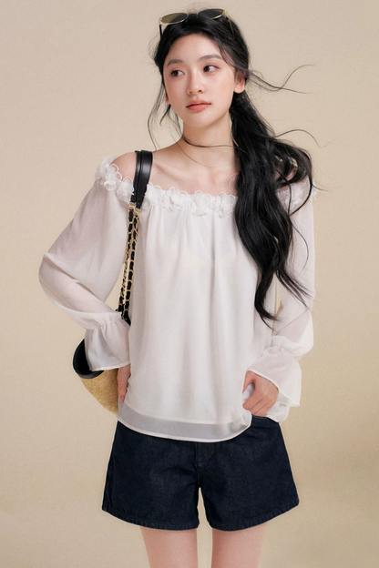 Blusa de gasa con flores tridimensionales