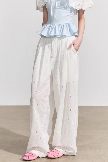 Pantaloni in cotone floreale bianco