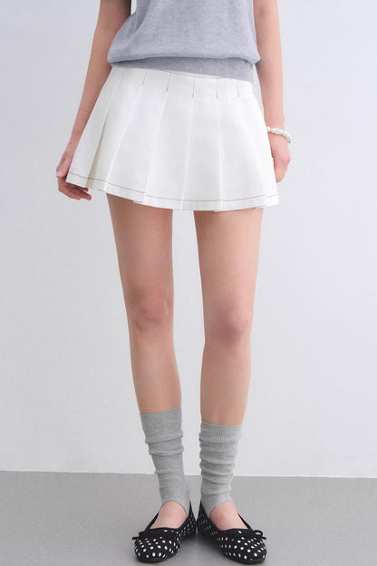 Jupe plissée en denim délavé blanc