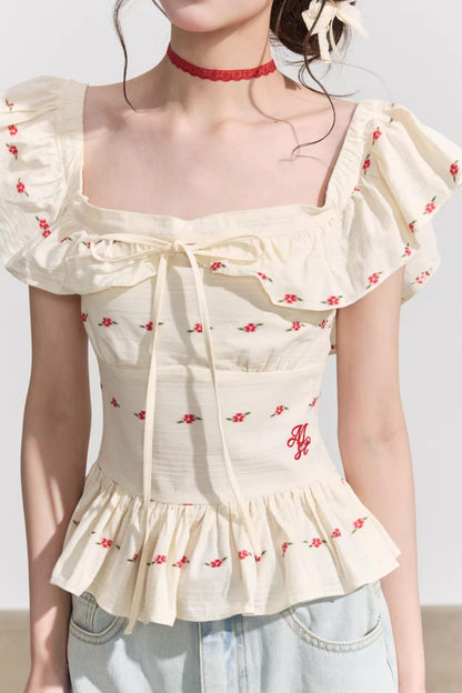Blusa francese a fiori con volant