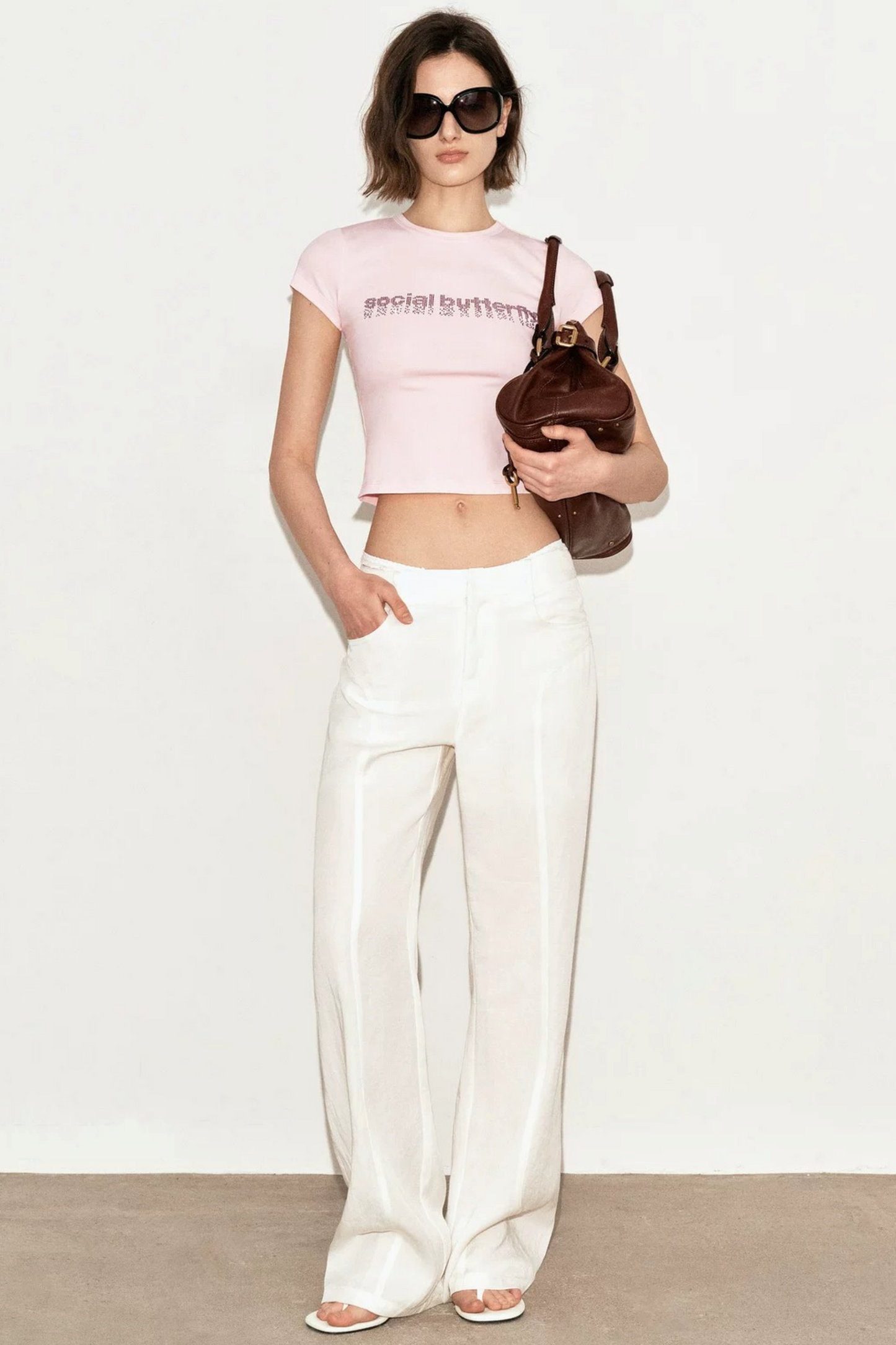 Maglia narrativa rosa con strass